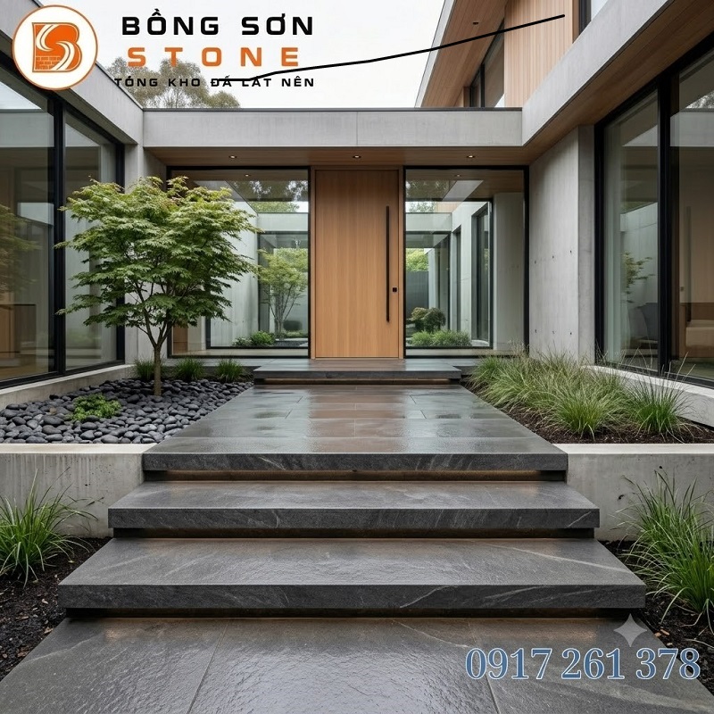 Tam Cấp Nên Dùng Đá Gì? So Sánh Đá Granite, Đá Xanh Và Đá Bazan 6 Chiêm ngưỡng vẻ đẹp mạnh mẽ, hiện đại của đá bazan ốp tam cấp cho biệt thự tối giản.